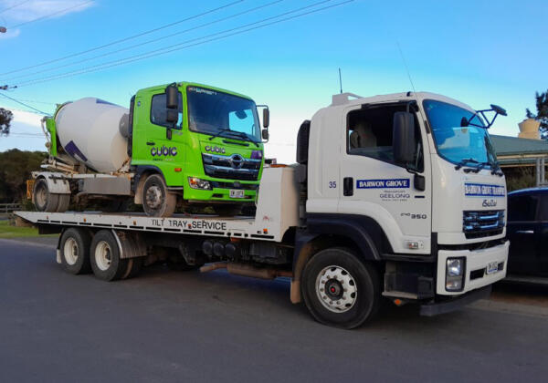 Tilt tray truck transporting heaving haulage, Geelong